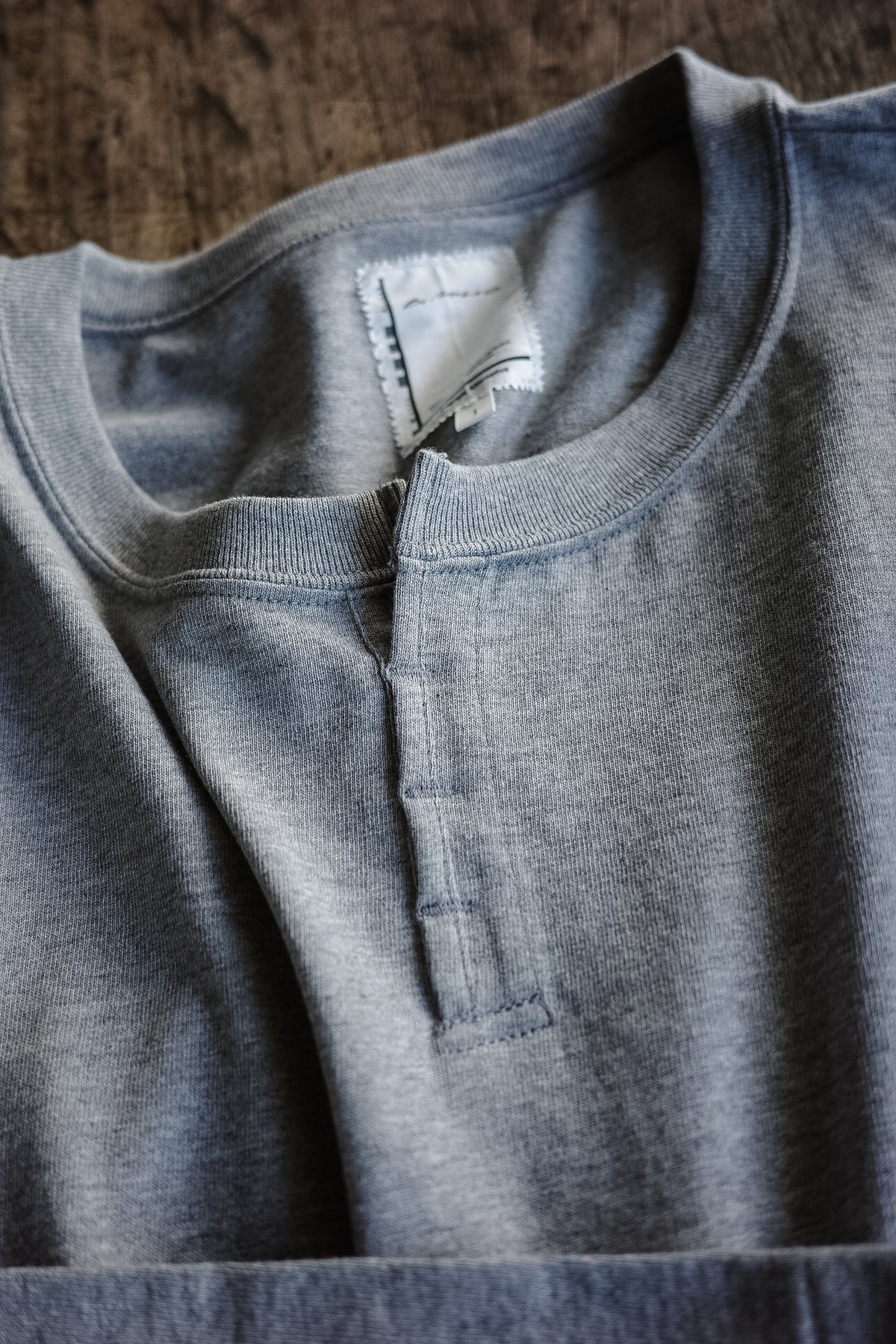 BLACKBIRD fake henley-neck cutsewn