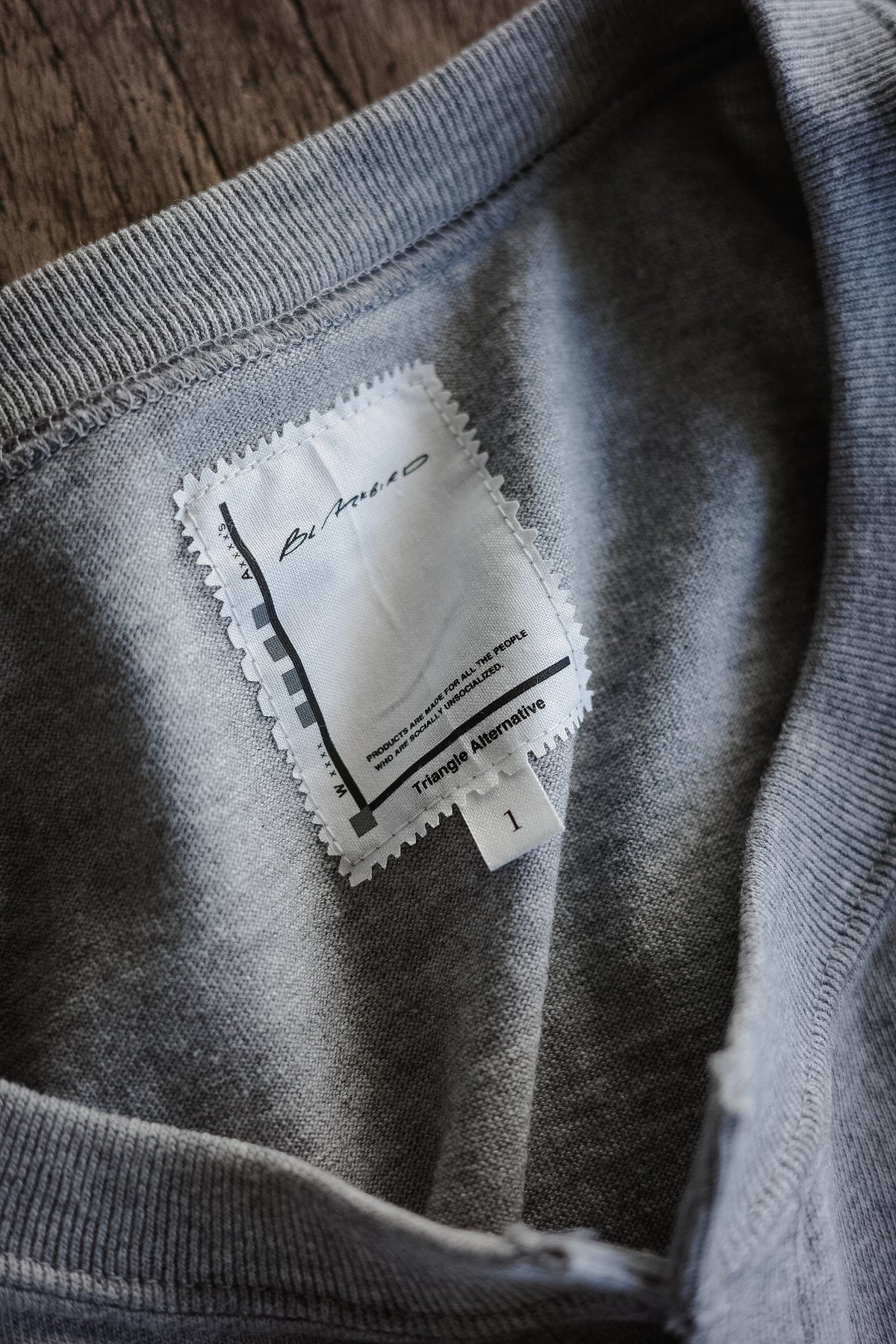 BLACKBIRD fake henley-neck cutsewn